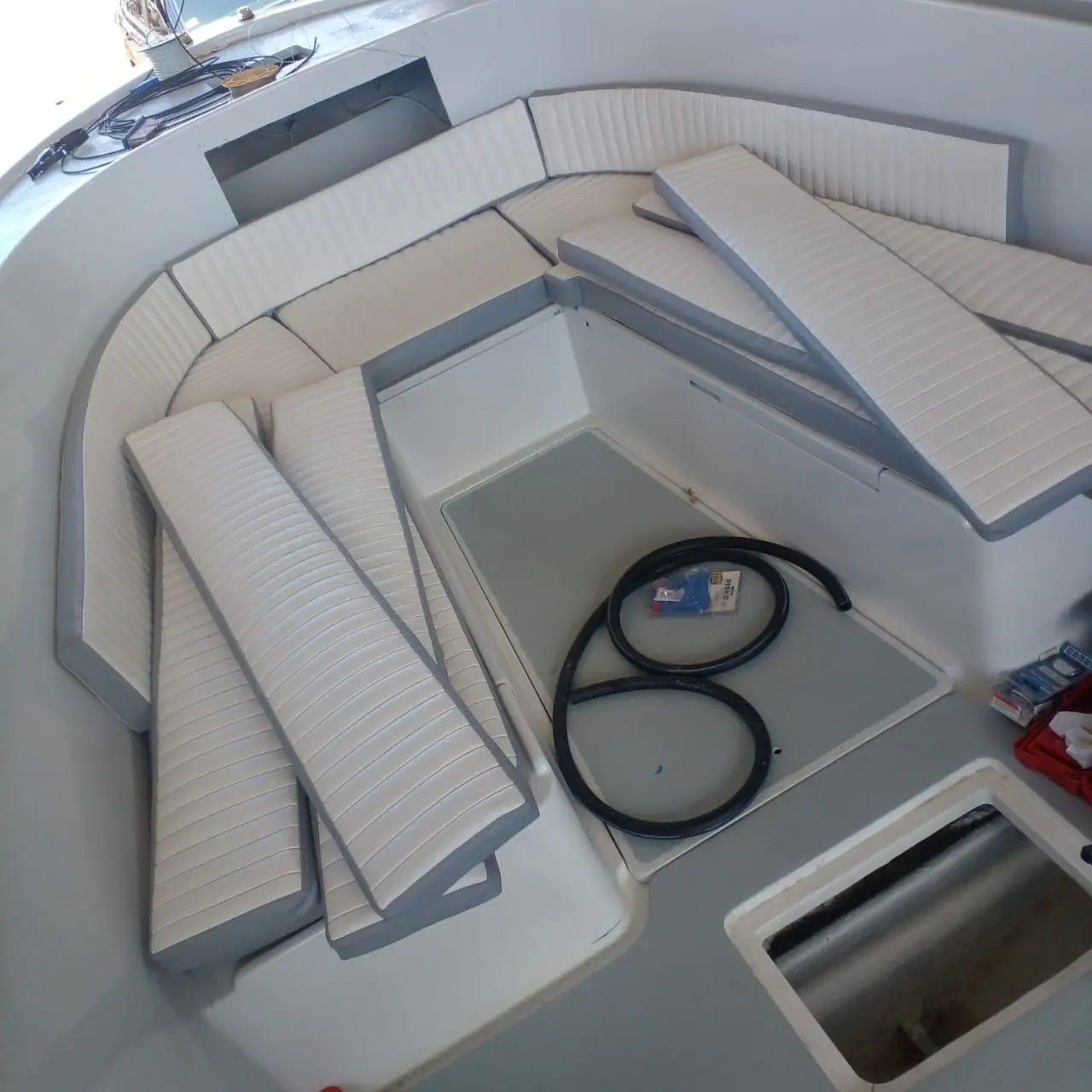 Cushions laid out in a freshly painted cockpit after refinishing by SXM Refinishing in St. Maarten