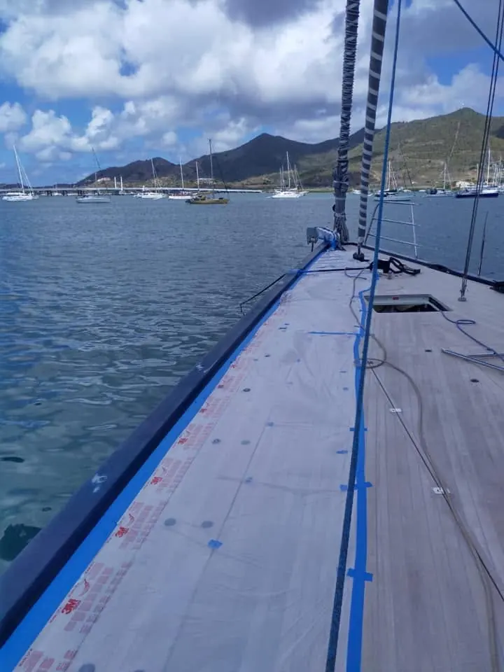 Teak deck masked with tape ahead of varnishing by SXM Refinishing in St. Maarten